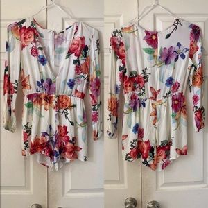 Rumor Boutique white multicolor floral plunging neckline long sleeve romper
